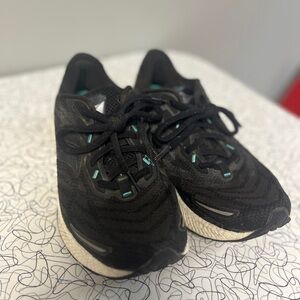 Saucony Black Sneakers with Teal Accents
